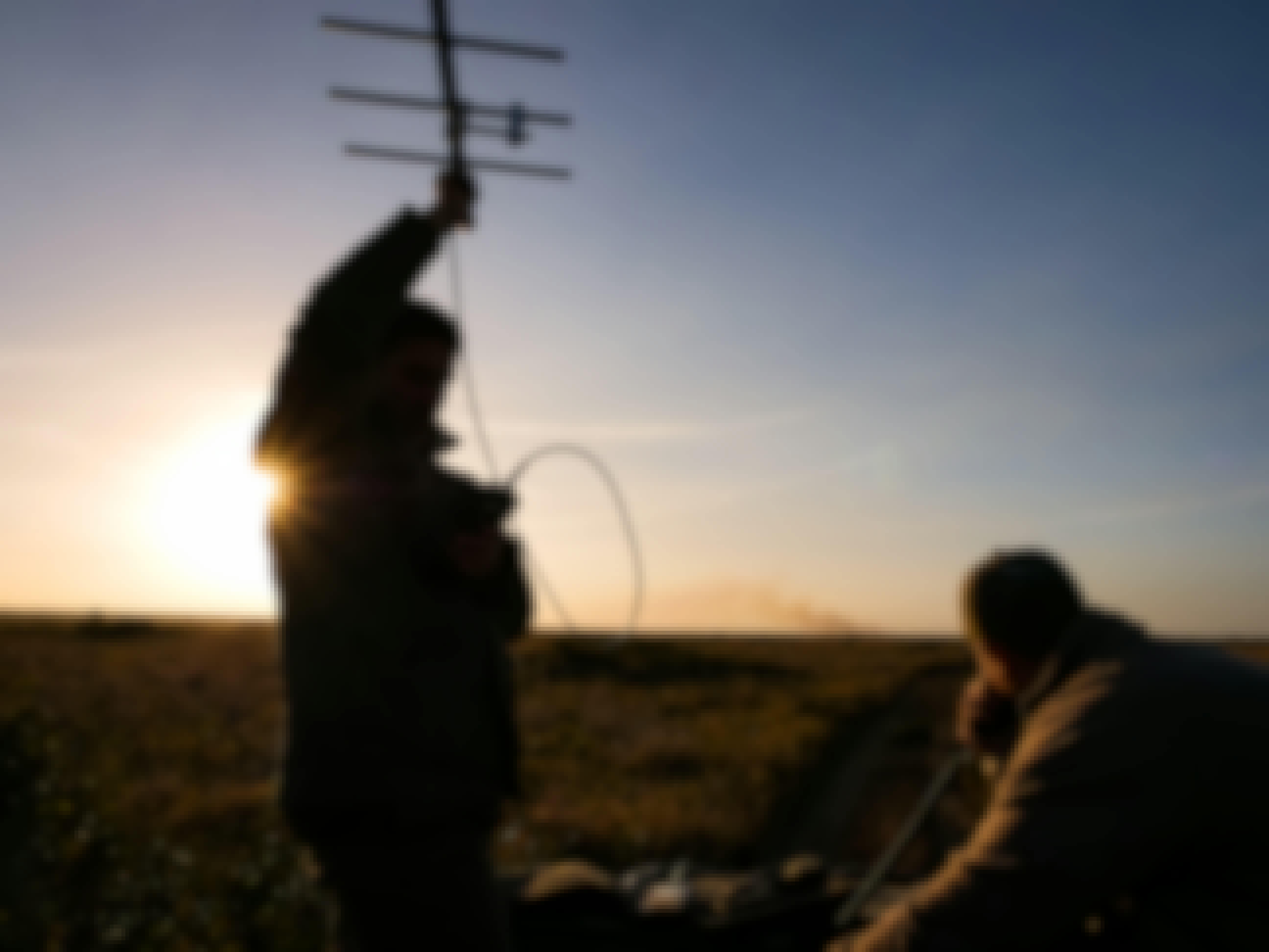ACE volunteers using telemetry as the sun sets, photo taken by volunteer Kaden