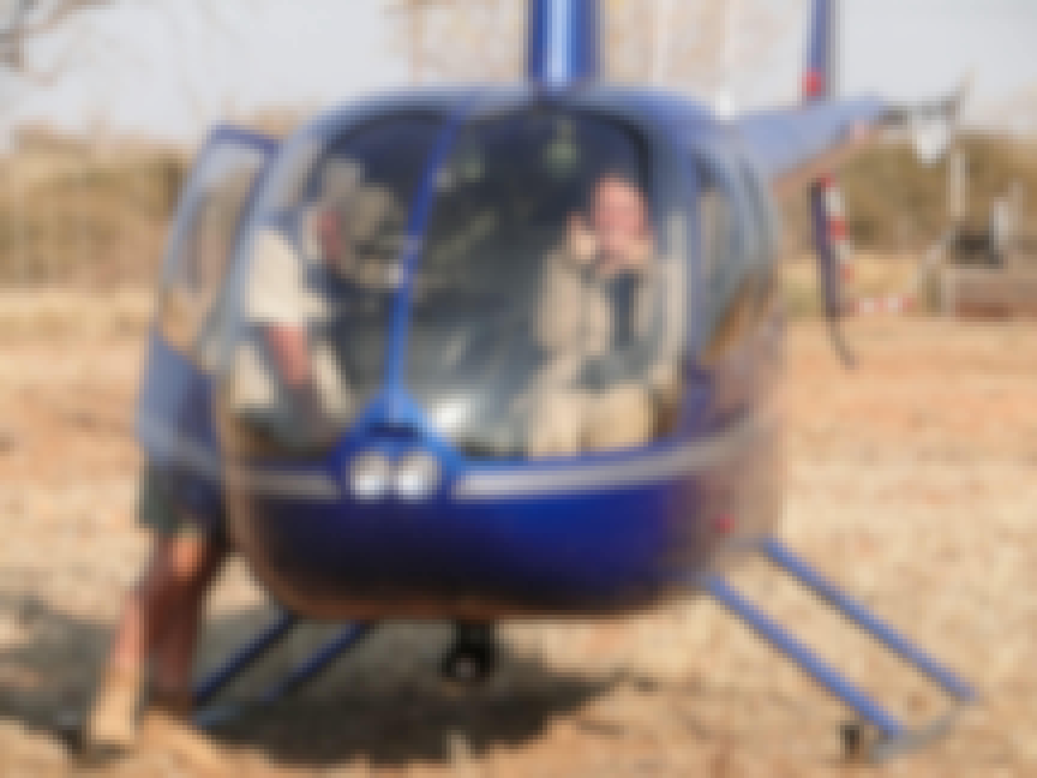ACE volunteer posing in helicopter