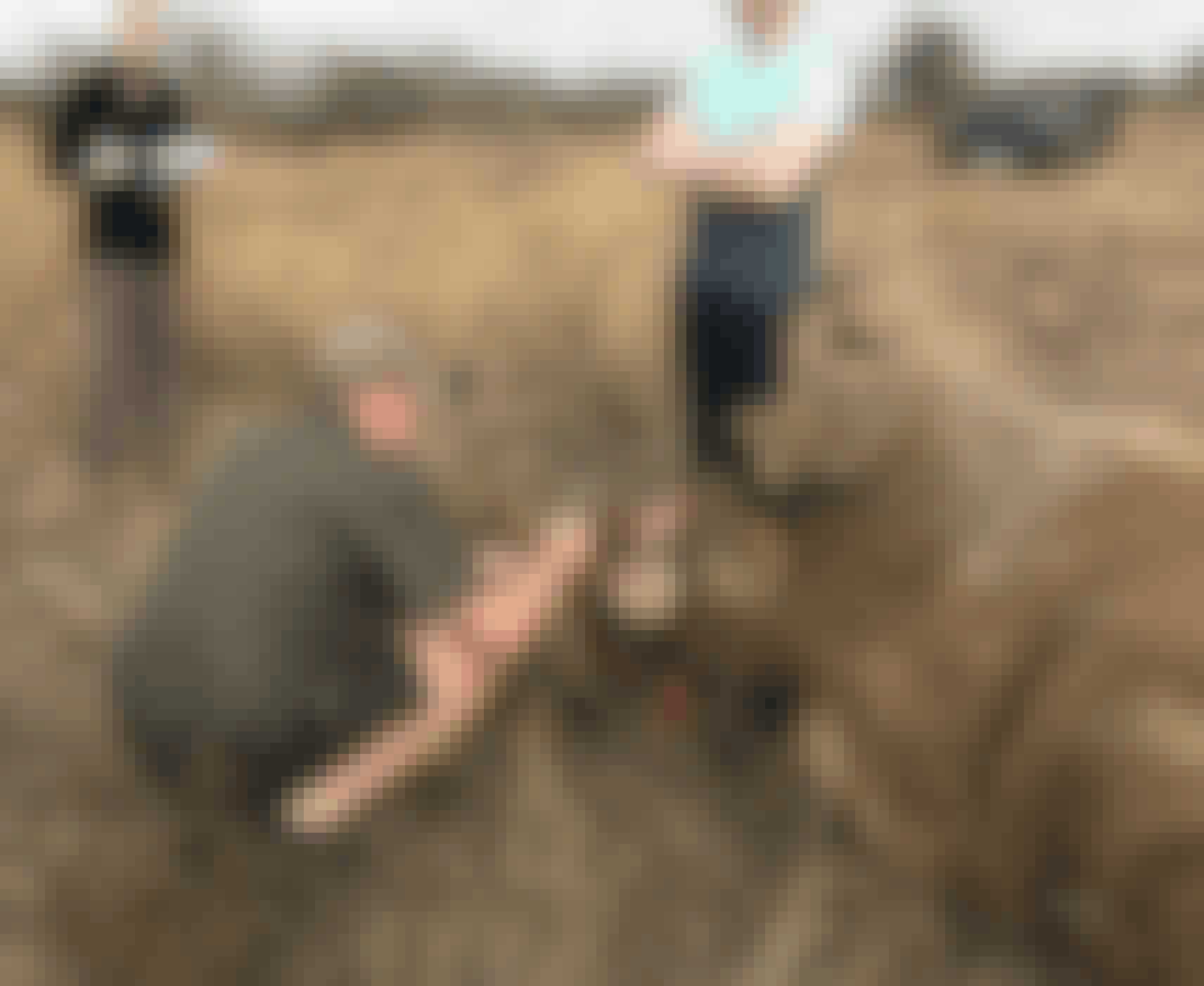 Jessica Gunn with a sedated rhino