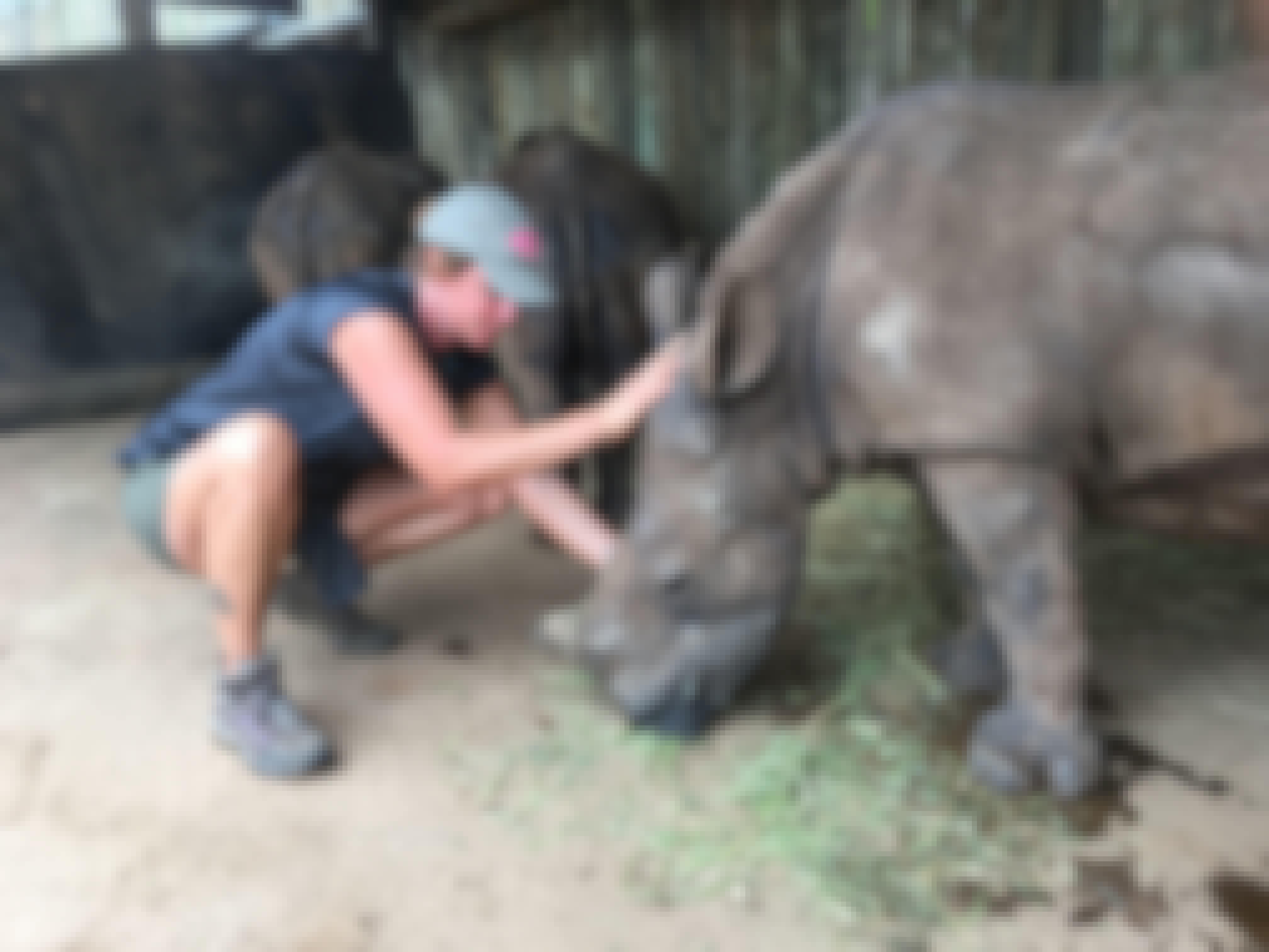 Diana DeBlanc with a rhino at Care for Wild