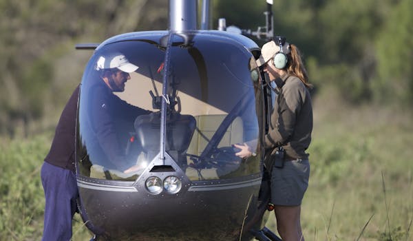 Cilla from Phinda with a helicopter pilot