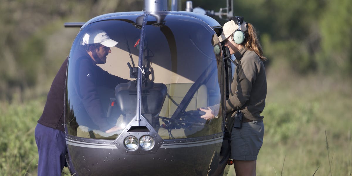 Cilla from Phinda with a helicopter pilot