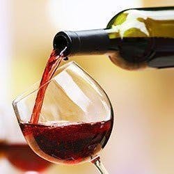 Pouring a glass of red wine