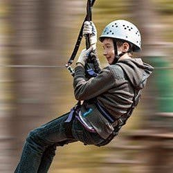 A child on a zip wire
