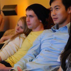 Friends watching a film together