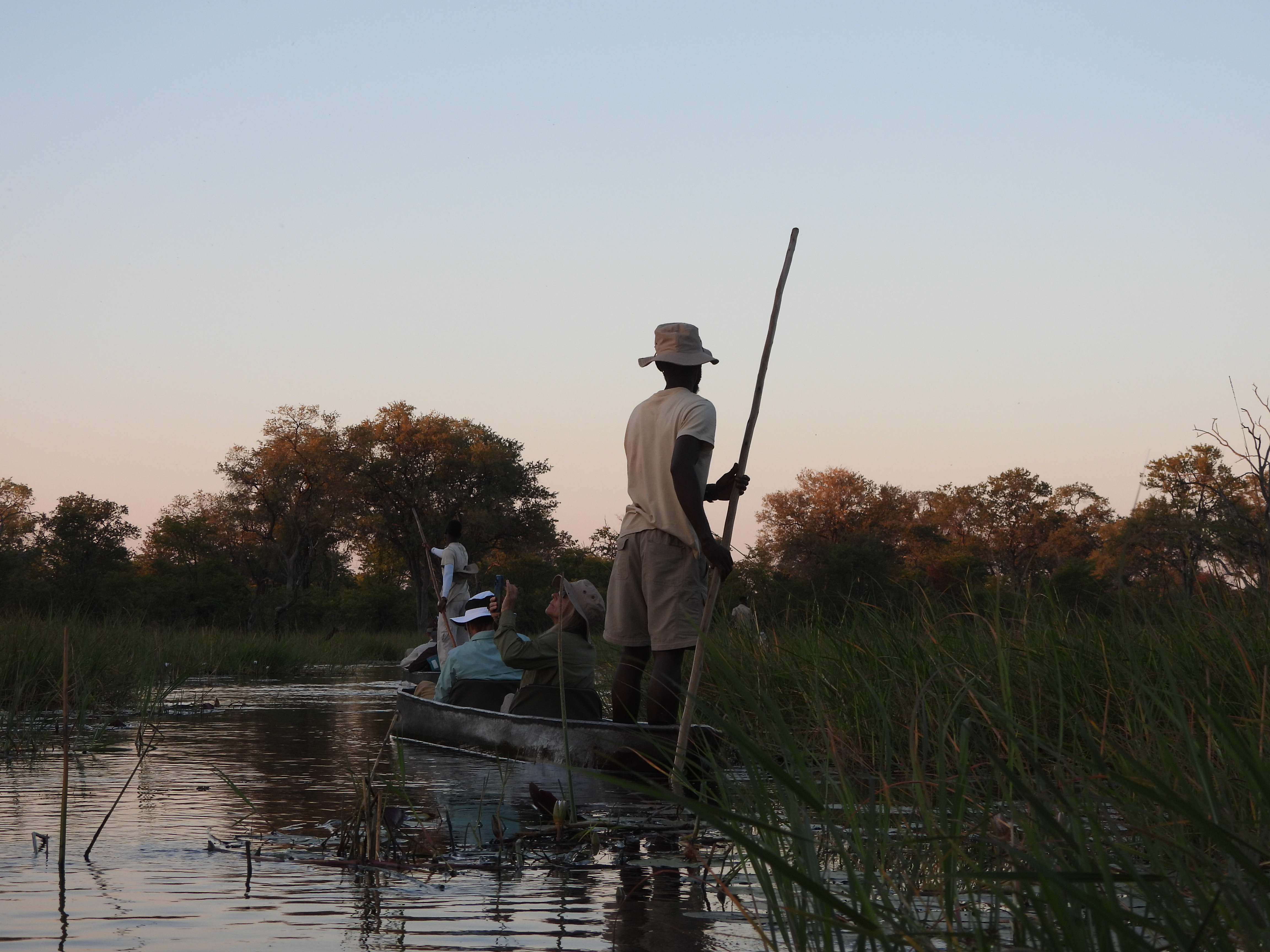 Volunteers on Mokoro boat trip down the Okavango Delta - Charles Pfeifer