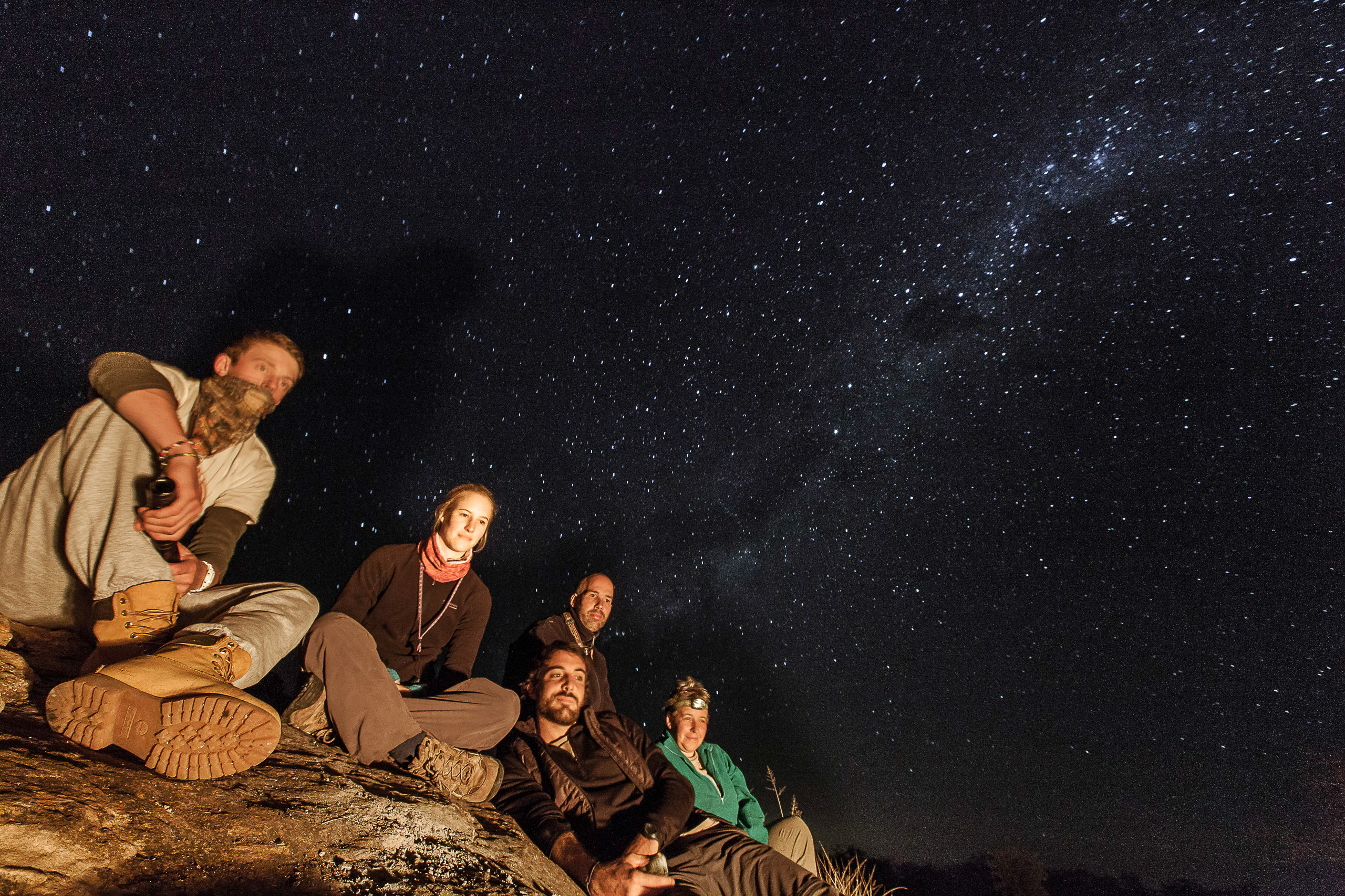 Game Ranger Conservation Experience - group hanging out under the stars 