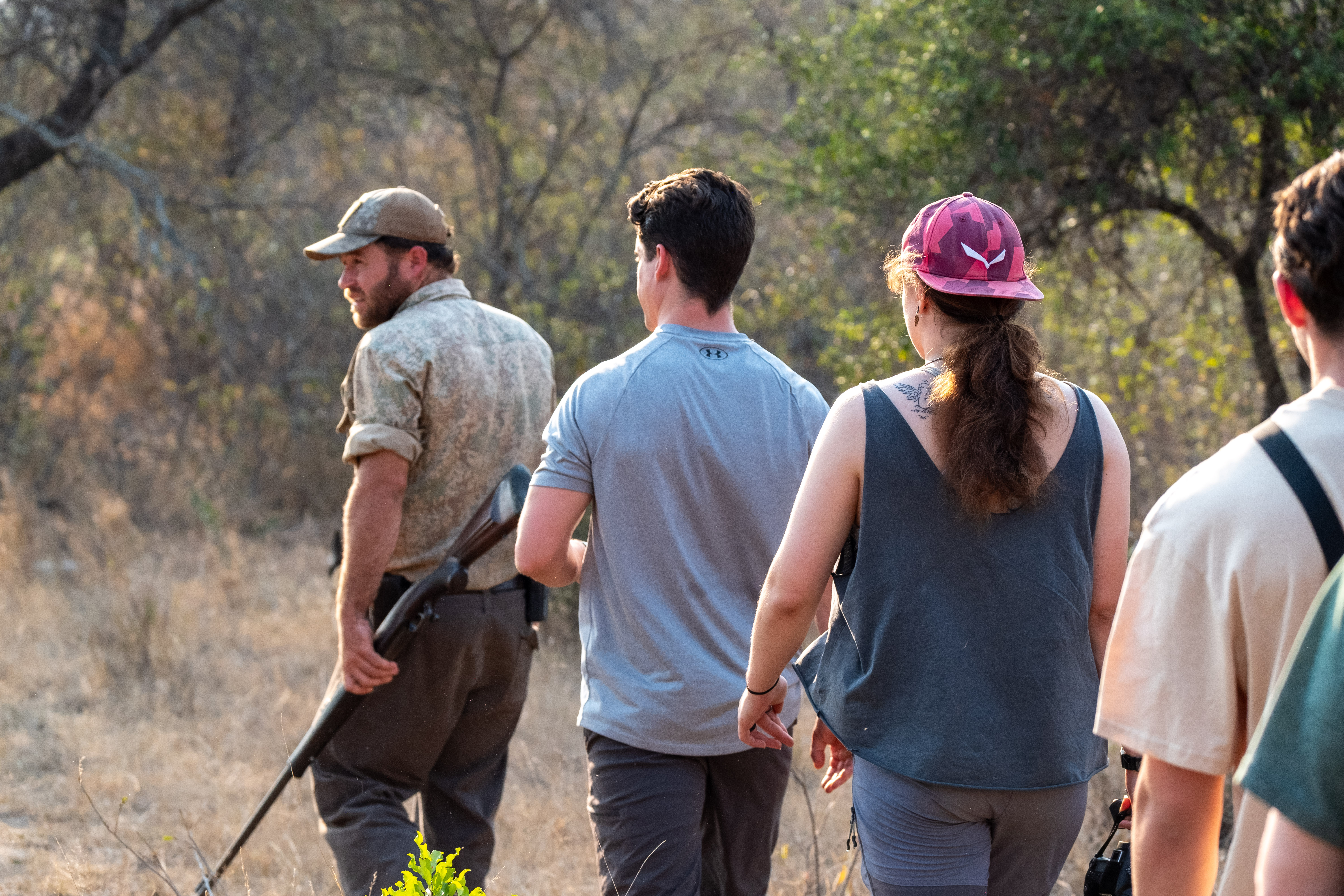 The Vikela Kruger Conservation Experience - volunteers walking through the bush with the guide 