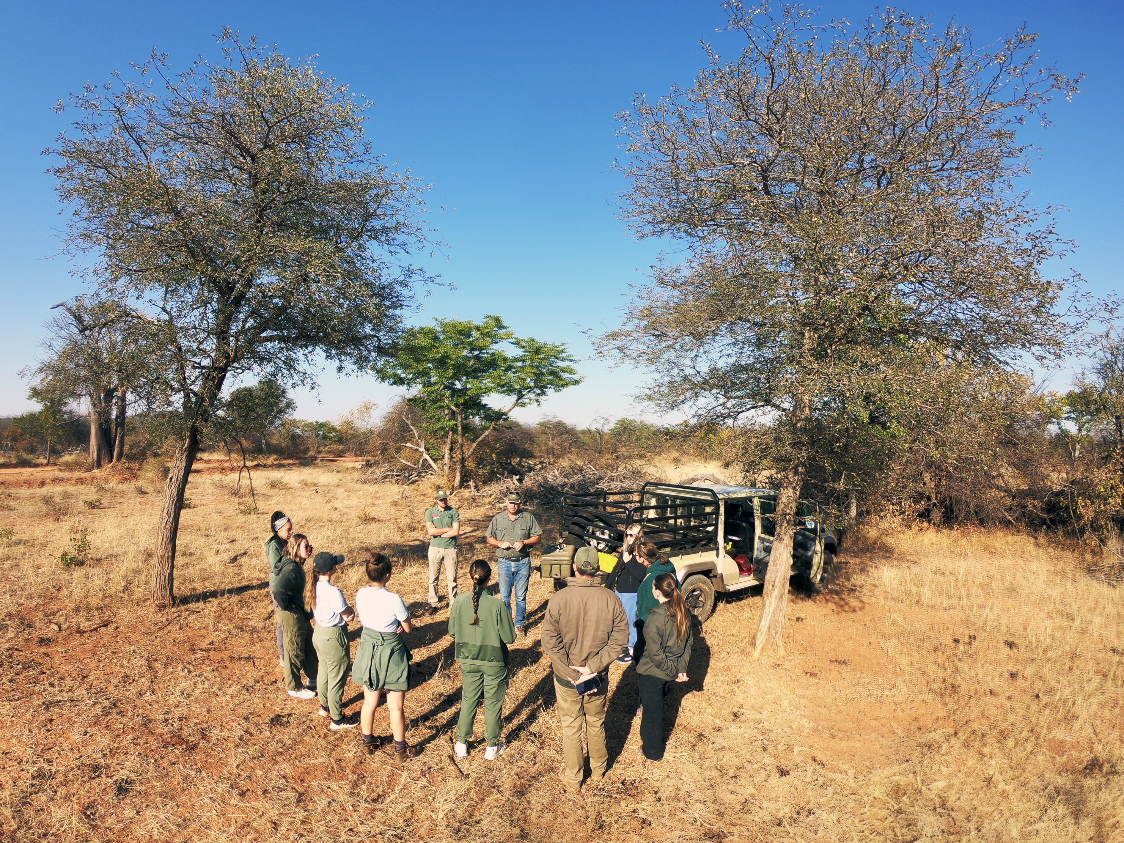 Shimongwe Expedition - group listening to a safety briefing