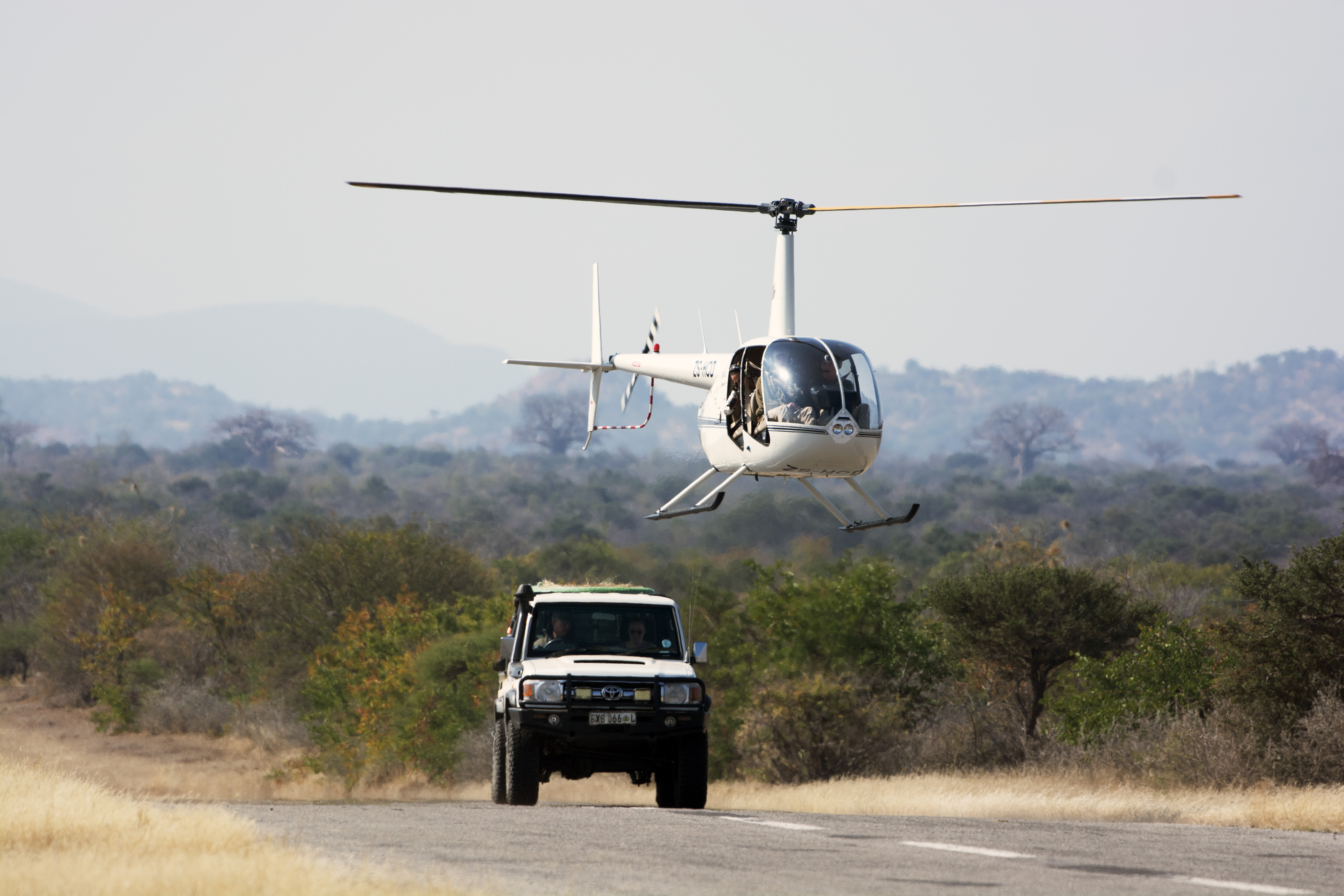 Shimongwe Expedition - vet volunteer practising darting from a helicopter
