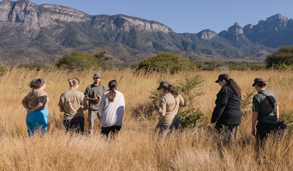 The Care And Conservation Discovery Experience - volunteers learning in the field