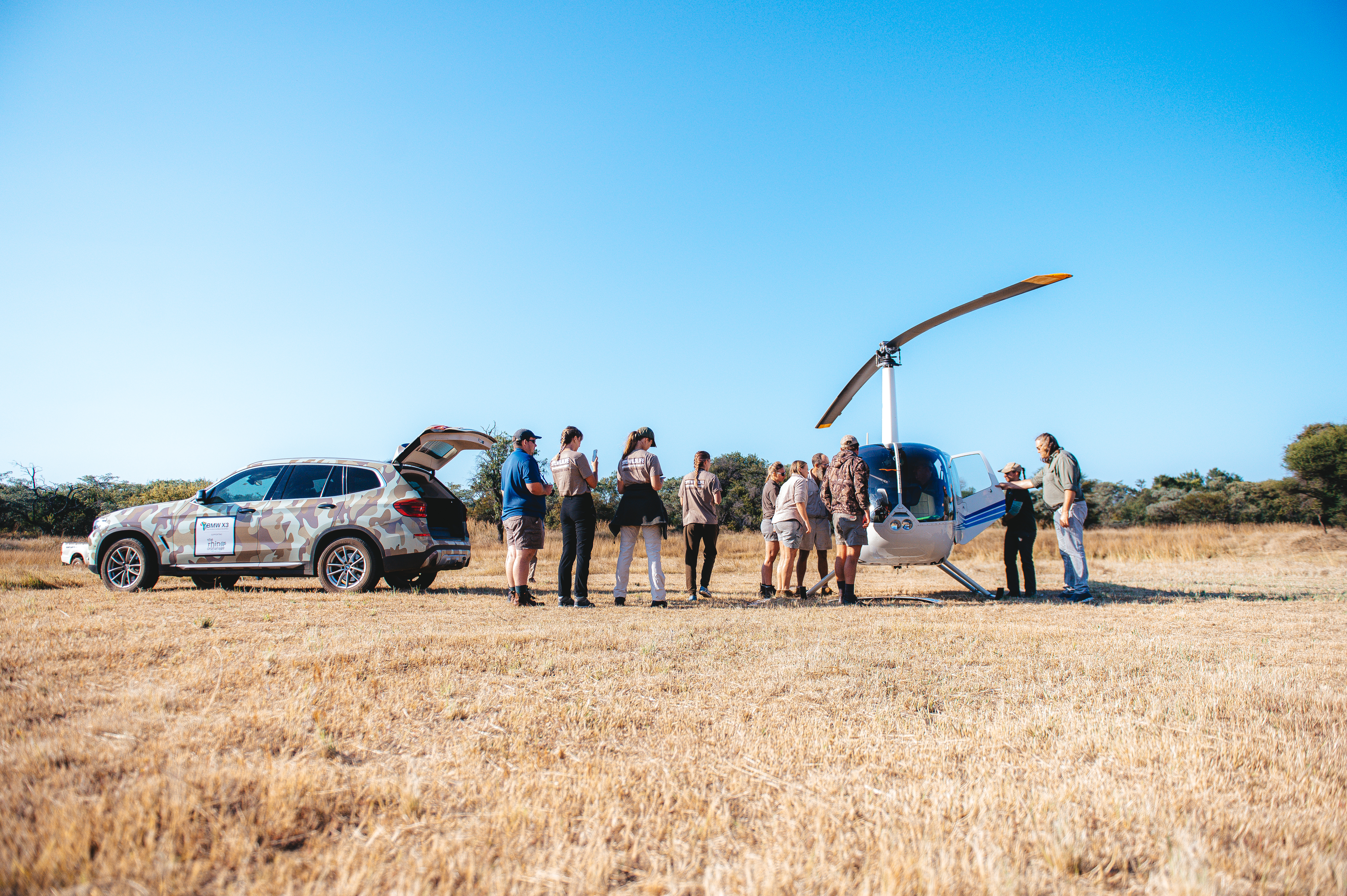 Veterinary Field Trip -  school group observing a helicopter 
