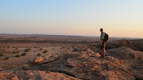 New Horizons Sabbatical - volunteer looking out over a vast landscape