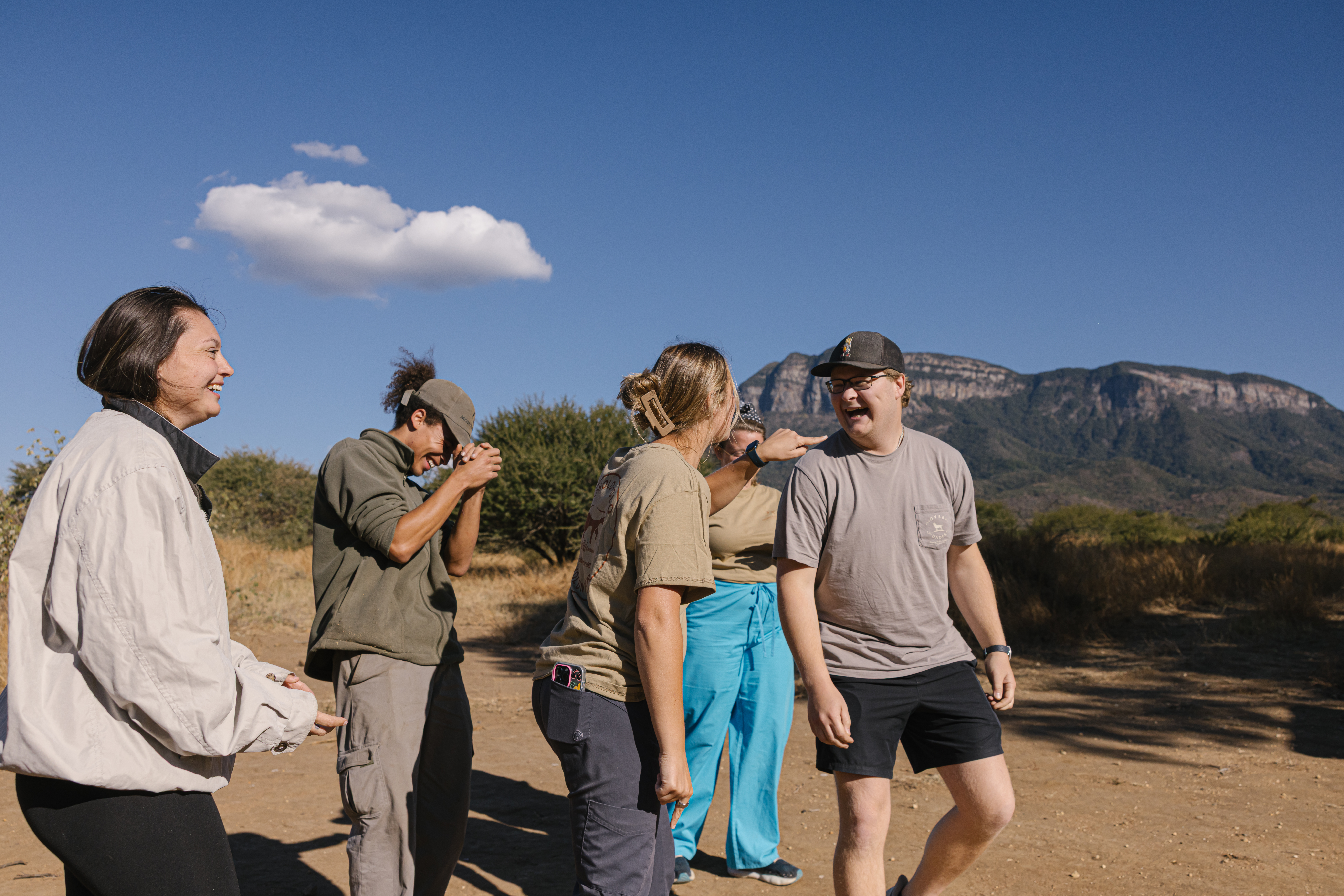 Tailor made travel - Volunteers laughing with staff at Moholoholo Wildlife Rehabilitation Centre