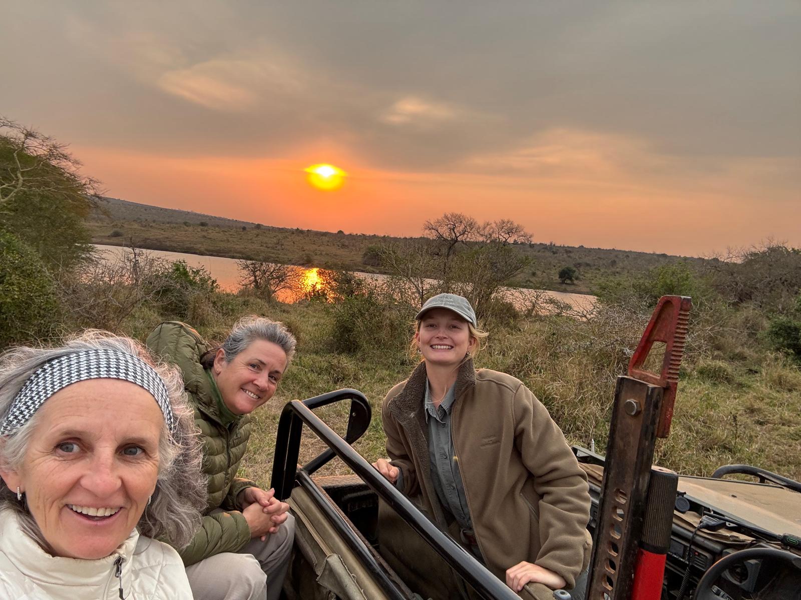 Di Roderick and Sam Hemmingway - Selfie smiling in the wild at sunset