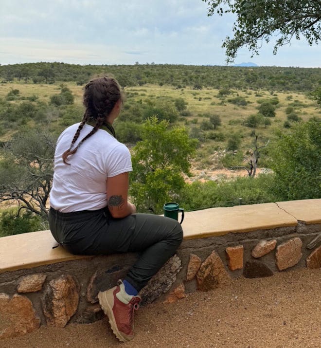 Kelly Cribari: Volunteer looking out at landscape