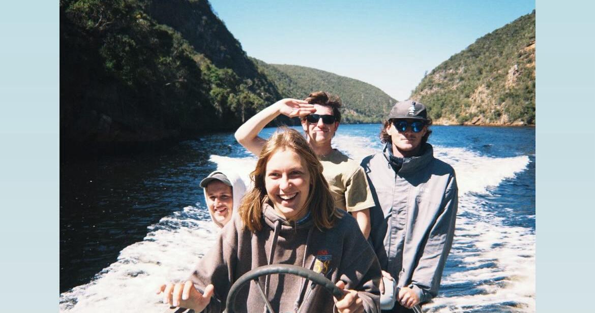 Timothy Donaldson - Group Smiling on a boat