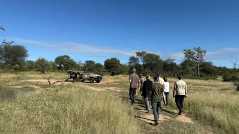 Juan Linares: group of volunteers walking to their vehicle 