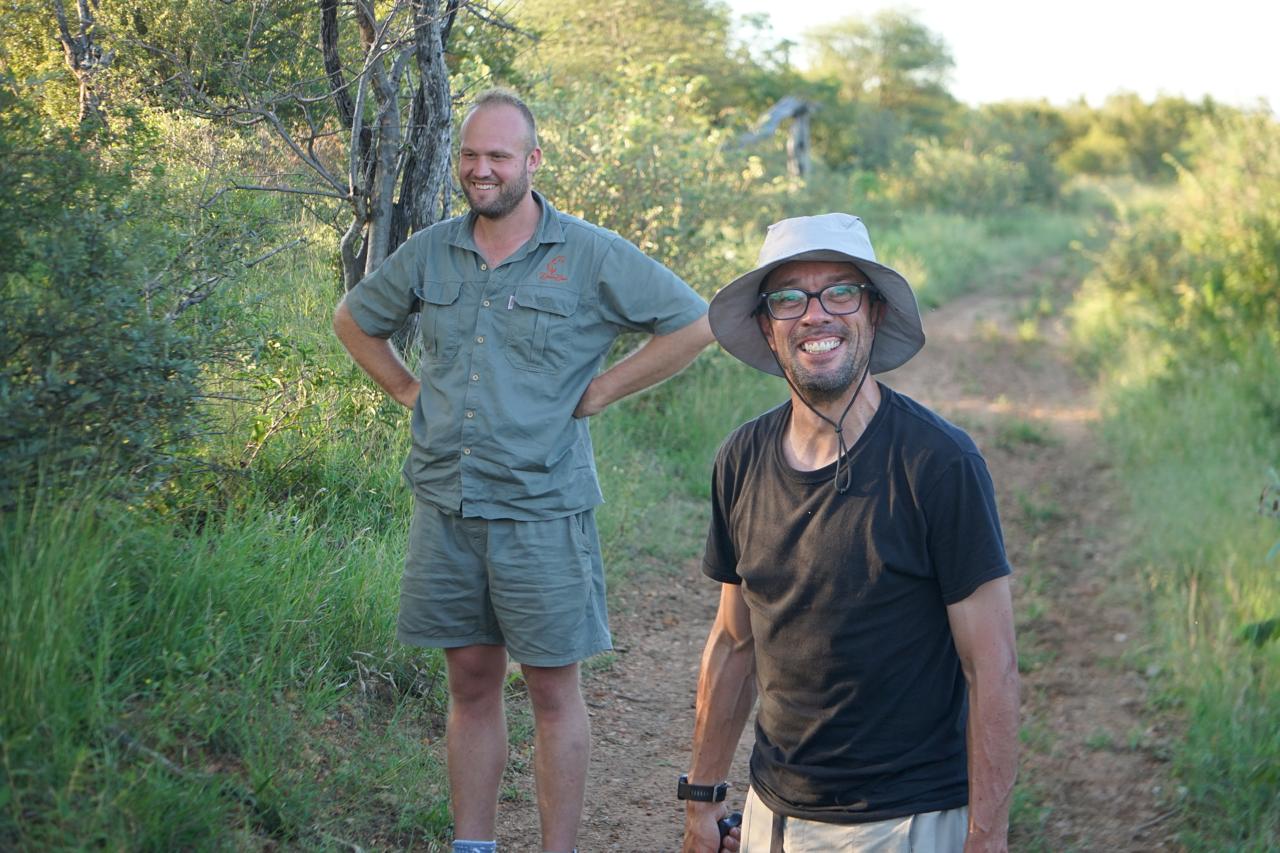Juan Linares: volunteer smiling at the camera in the bush