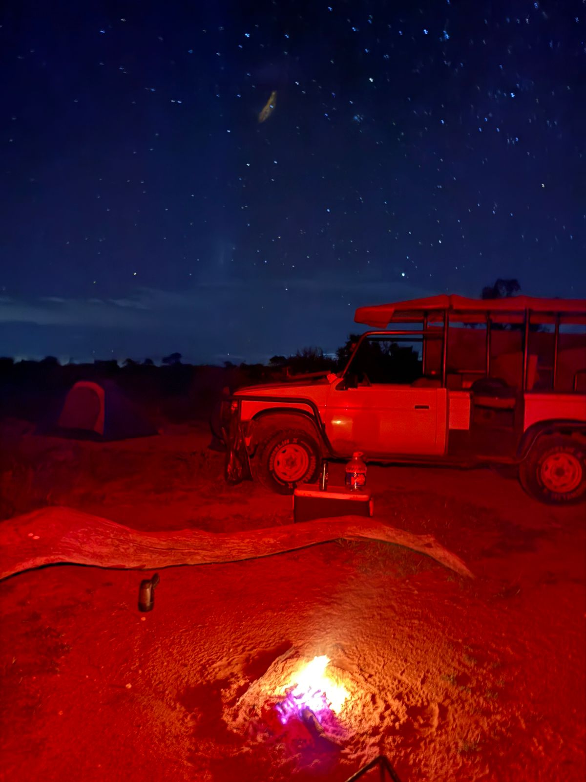 Juan Linares: campfire in front of the vehicle 