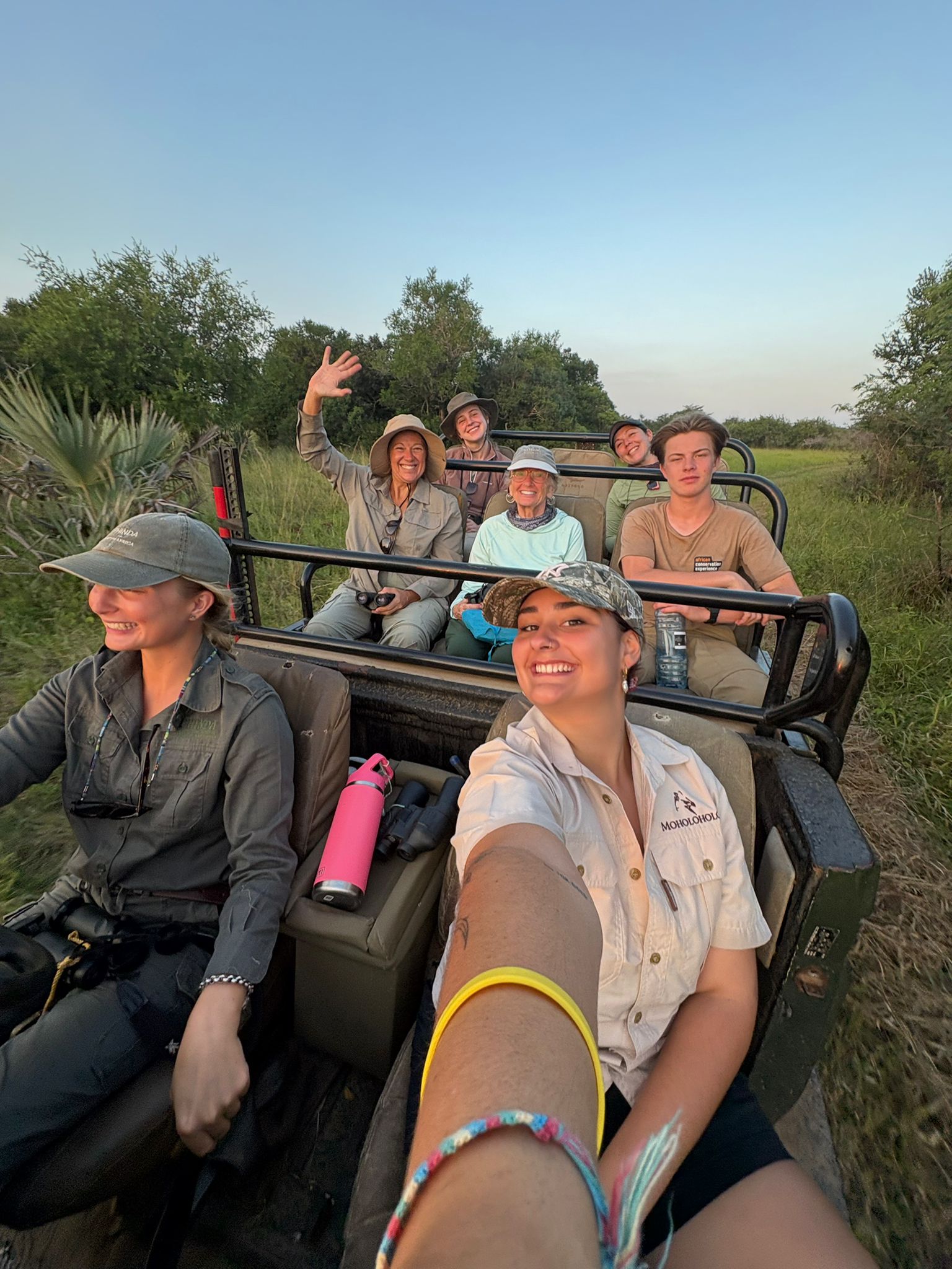 Paige Maine: a group of volunteers posing in their research vehicle 