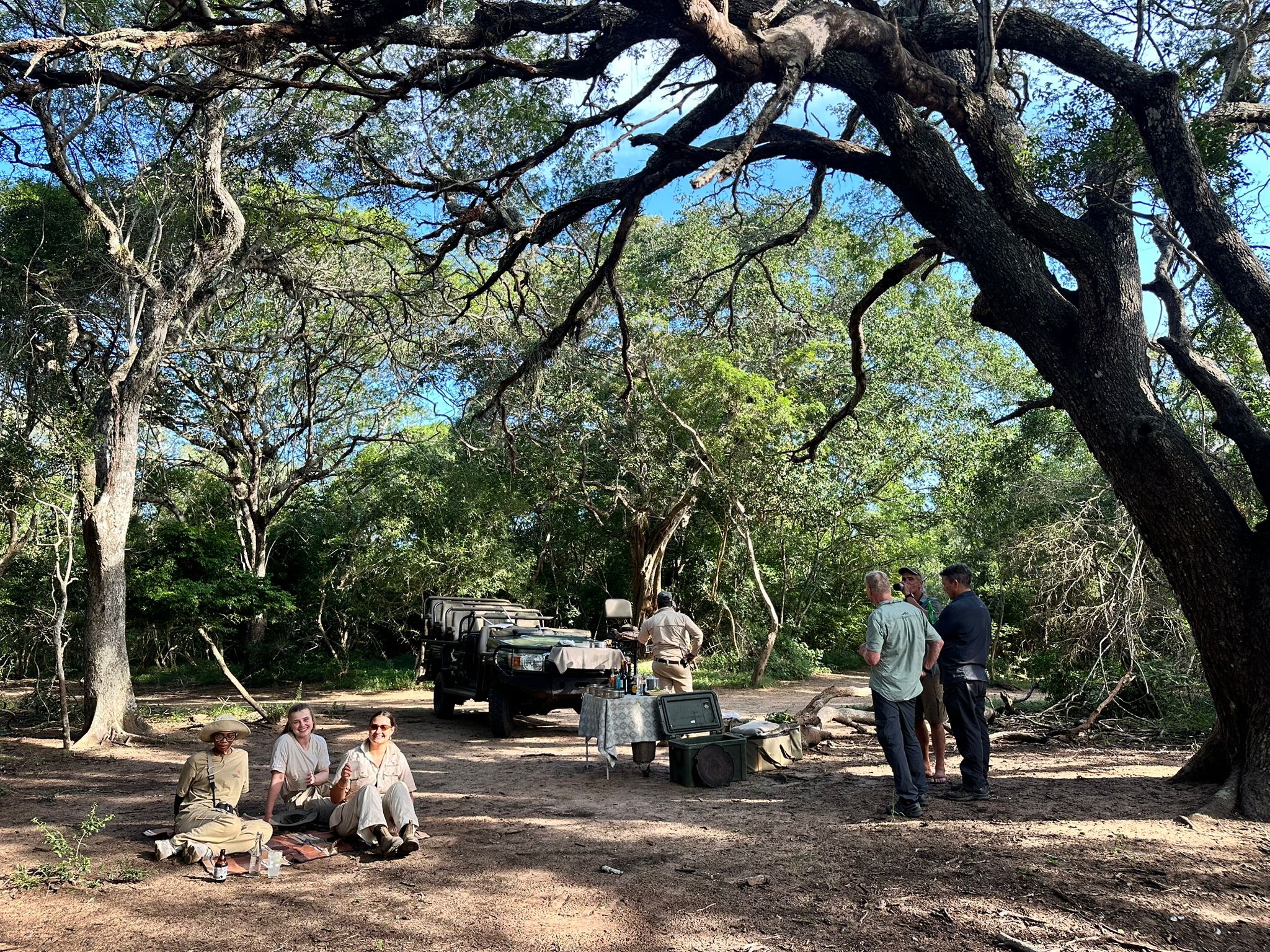 Paige Maine: volunteers having a picnic in the bush