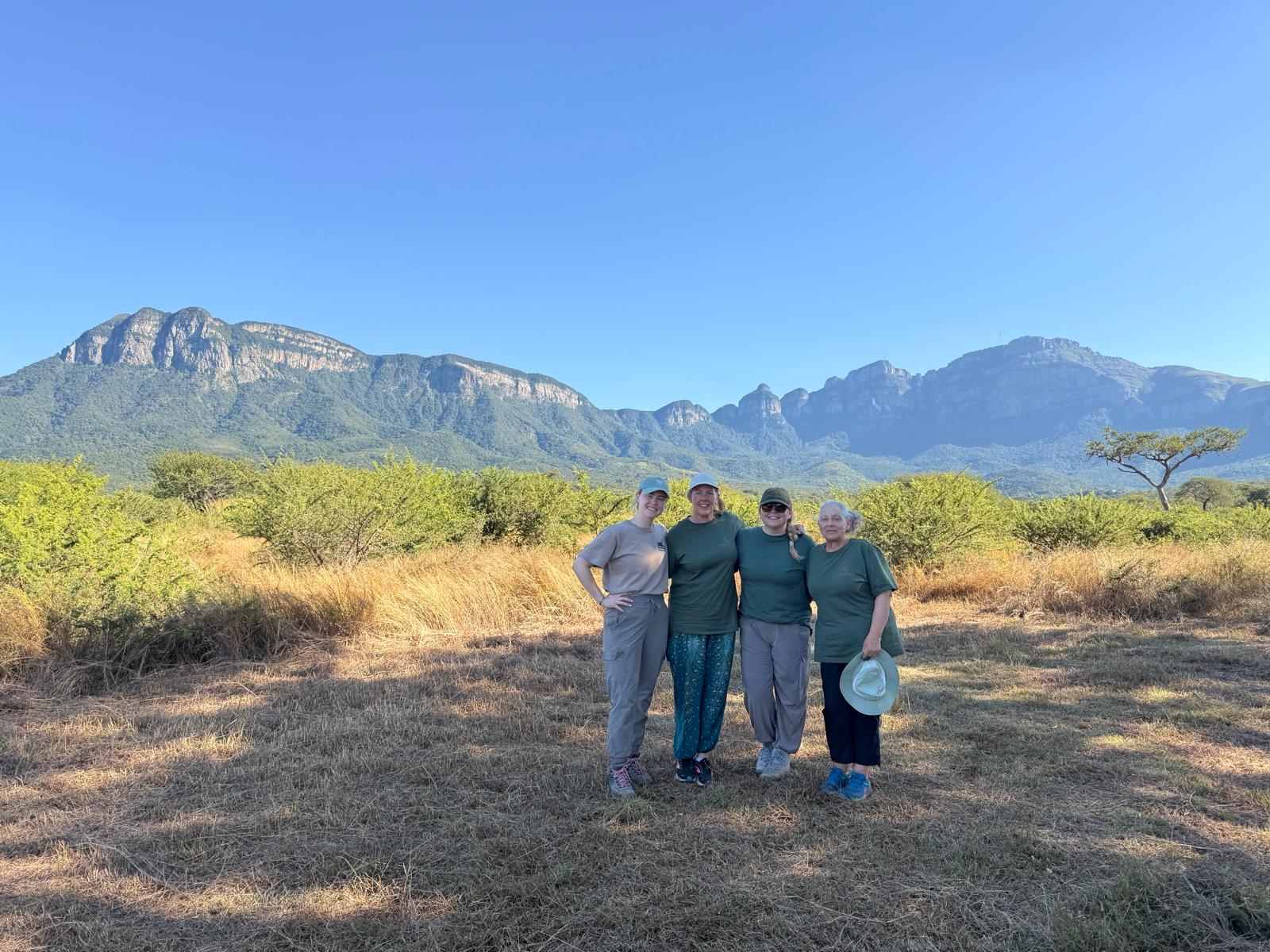 Katie Murray: Group photo of female volunteers outside Moholoholo