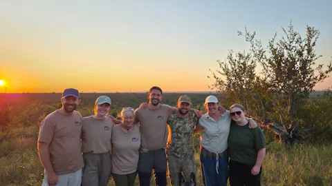 Katie Murray: Group photo at sunset on Vikela project