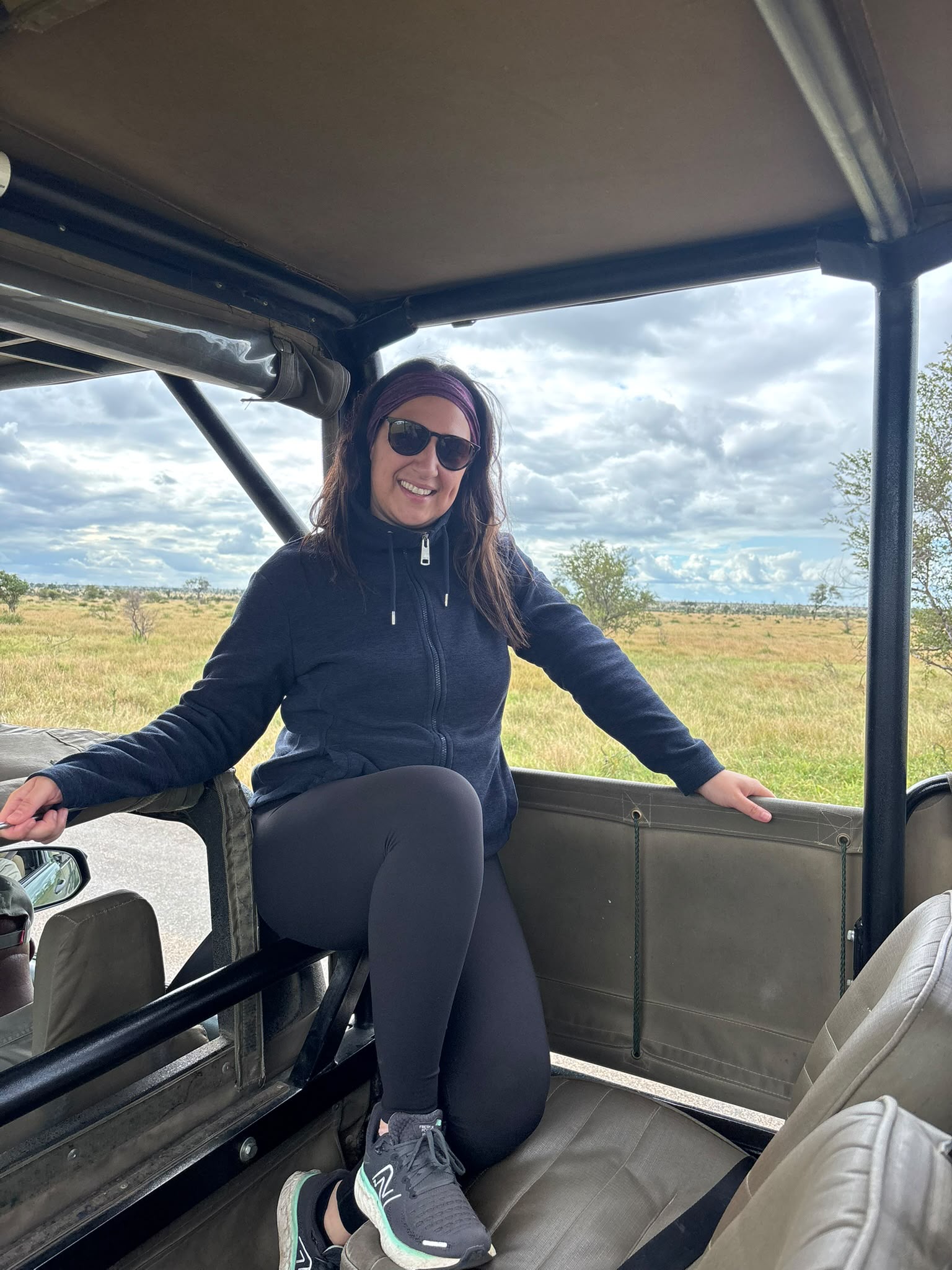 Natalie Gibbings - Posing on vehicle in the Kruger National Park