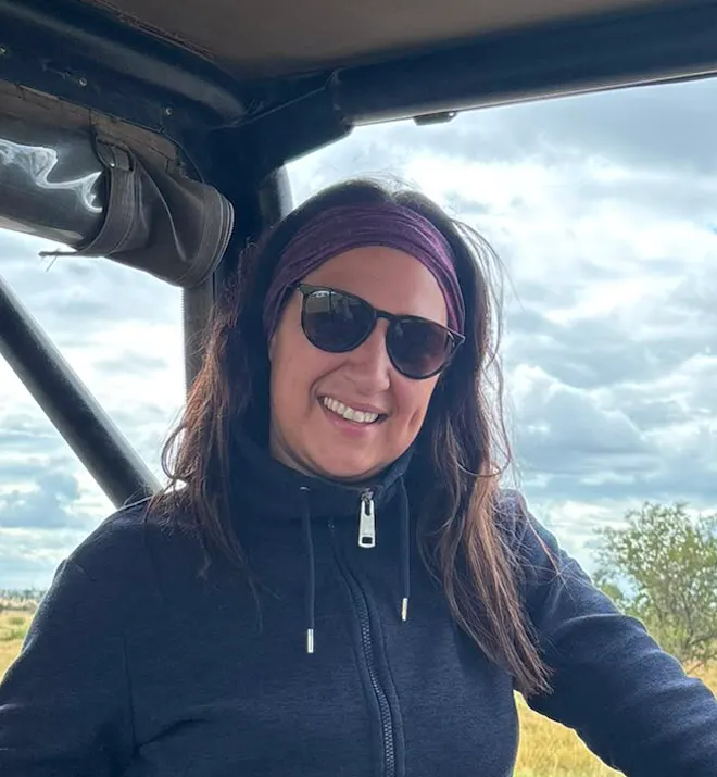 Natalie Gibbings - Posing on vehicle in the Kruger National Park