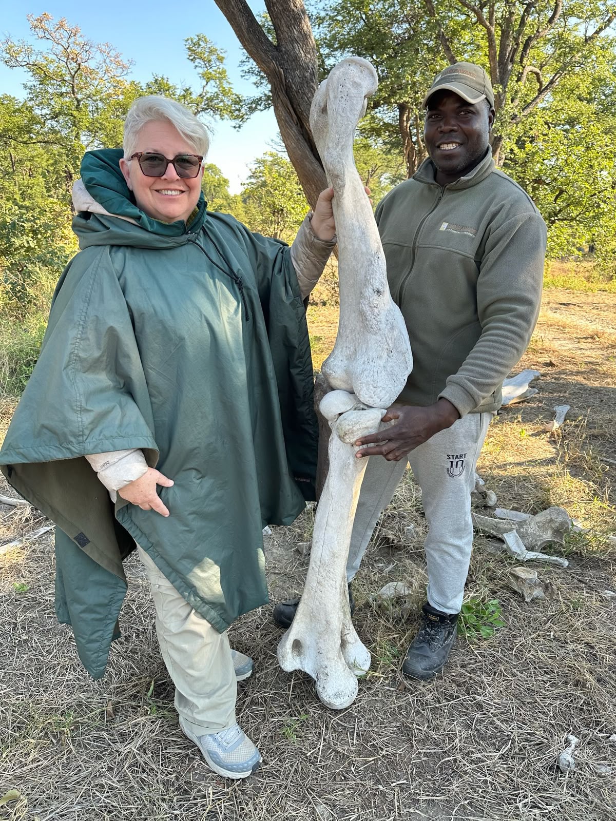 Vittoria Trainer stood next to animal bones in Botswana on the Okavango project