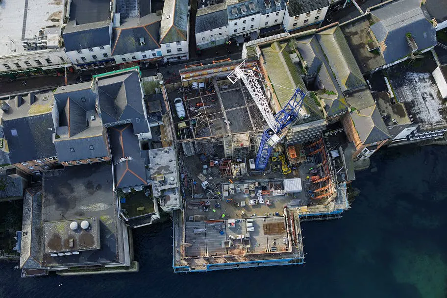 Bird’s eye view of the full site, illustrating the tight and complex working environment between the live high street and the waterfront.