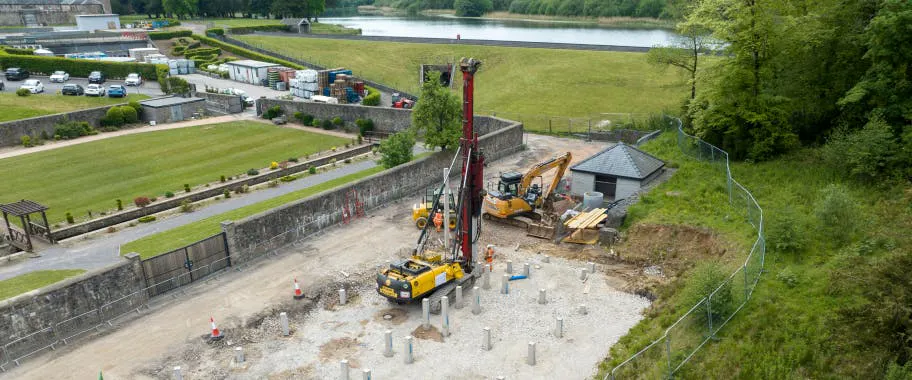 In recent months, piling was completed, as shown here. Since then, the first walls have begun to take shape.