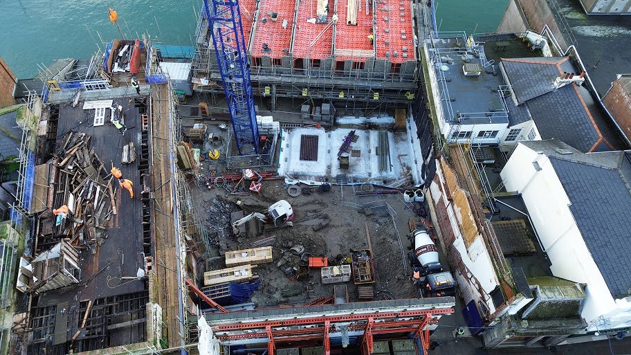 Aerial view of Phase 3 groundworks at Market Street, with piling complete and reduced dig underway ahead of waterproofing and reinforcement works.