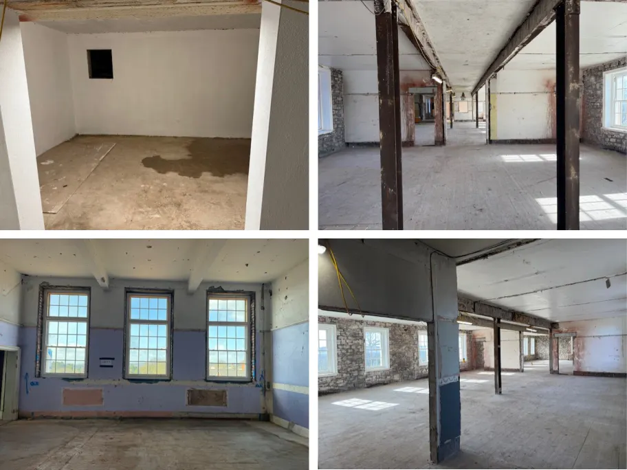 Internal render stripped back across the main building, exposing original stonework and structural columns ahead of drylining.