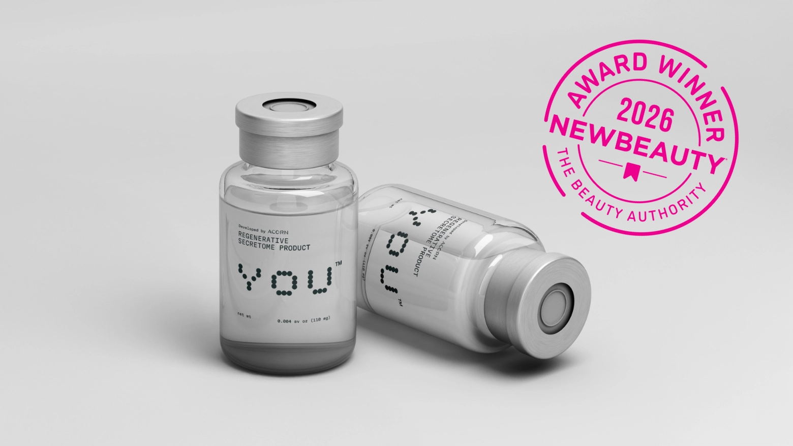 Acorn secretome vials with a pink NewBeauty award seal