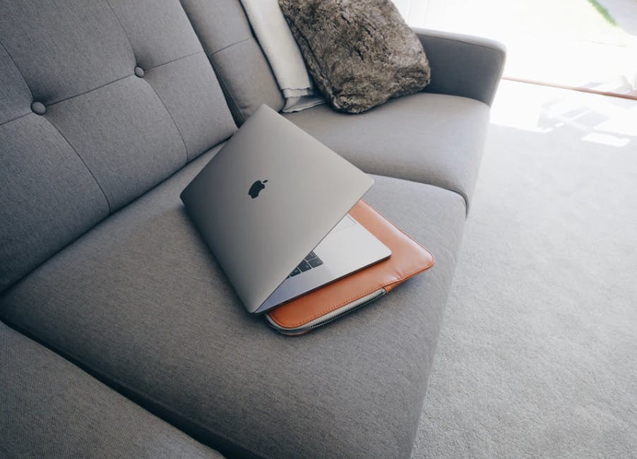 Laptop on a sofa