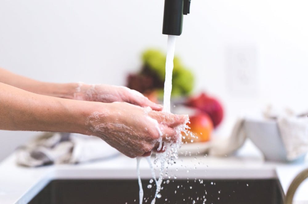 Washing hands in the kitchen