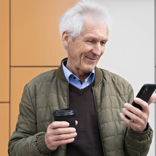 Man using the ADI Network app to find driving instructor jobs