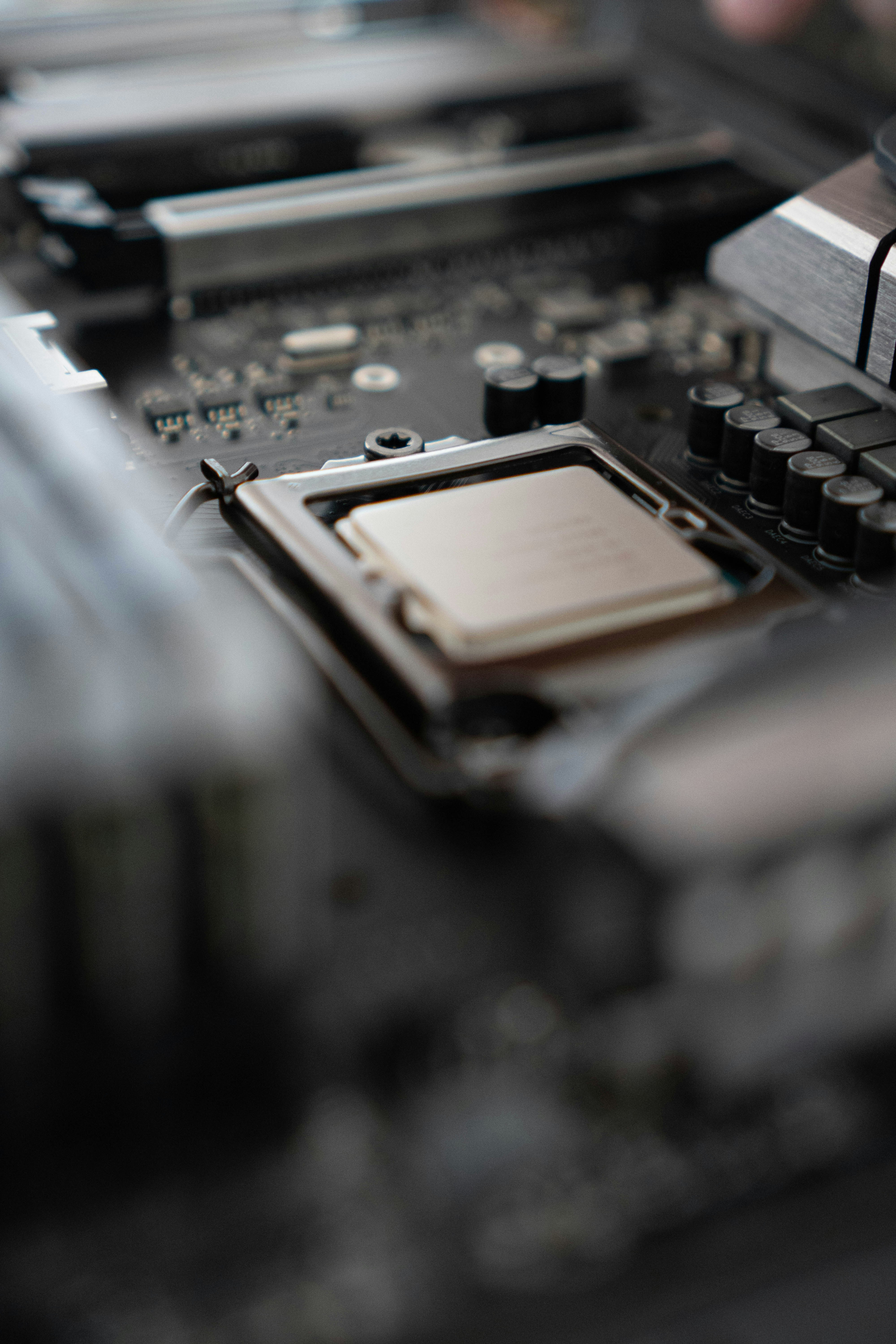 Close-up of a printed circuit board (PCB) with focus on a single electronic component, highlighting precision engineering in modern electronics manufacturing