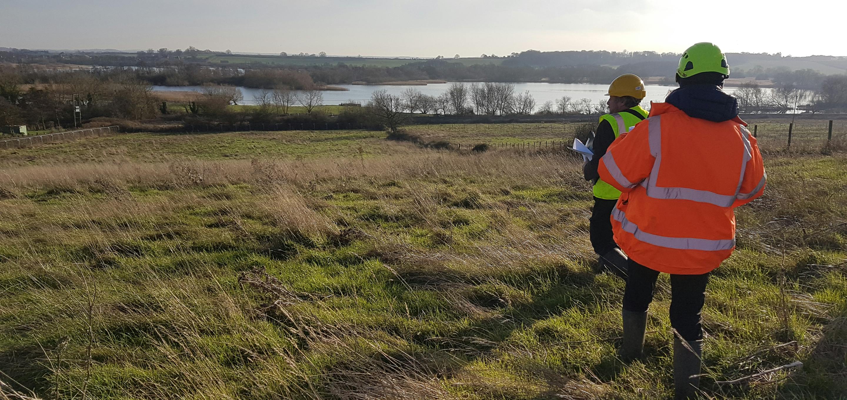 Surveyors at Redrow site The Hoplands