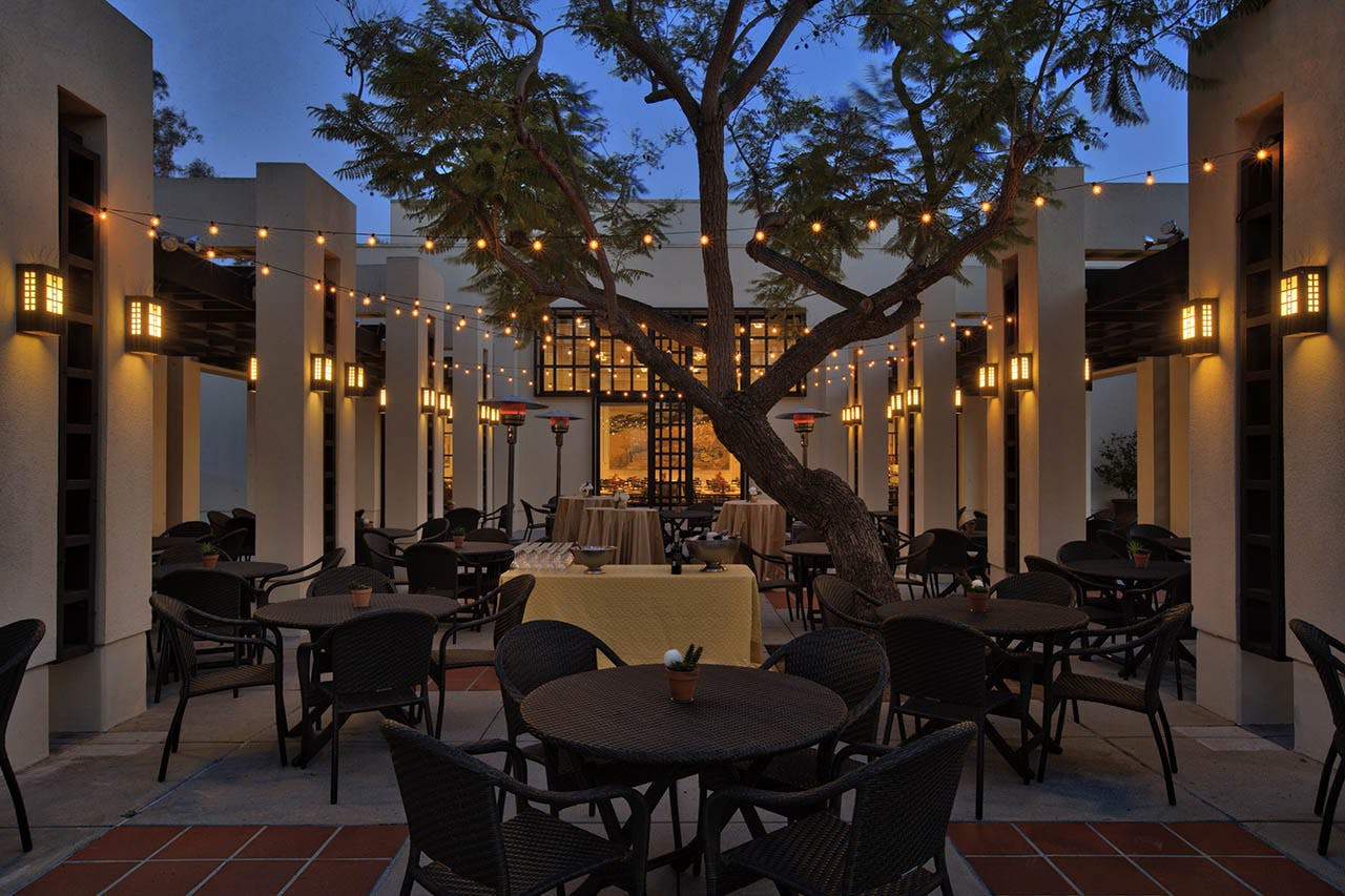 Evening photo of a patio at the Beckman Center