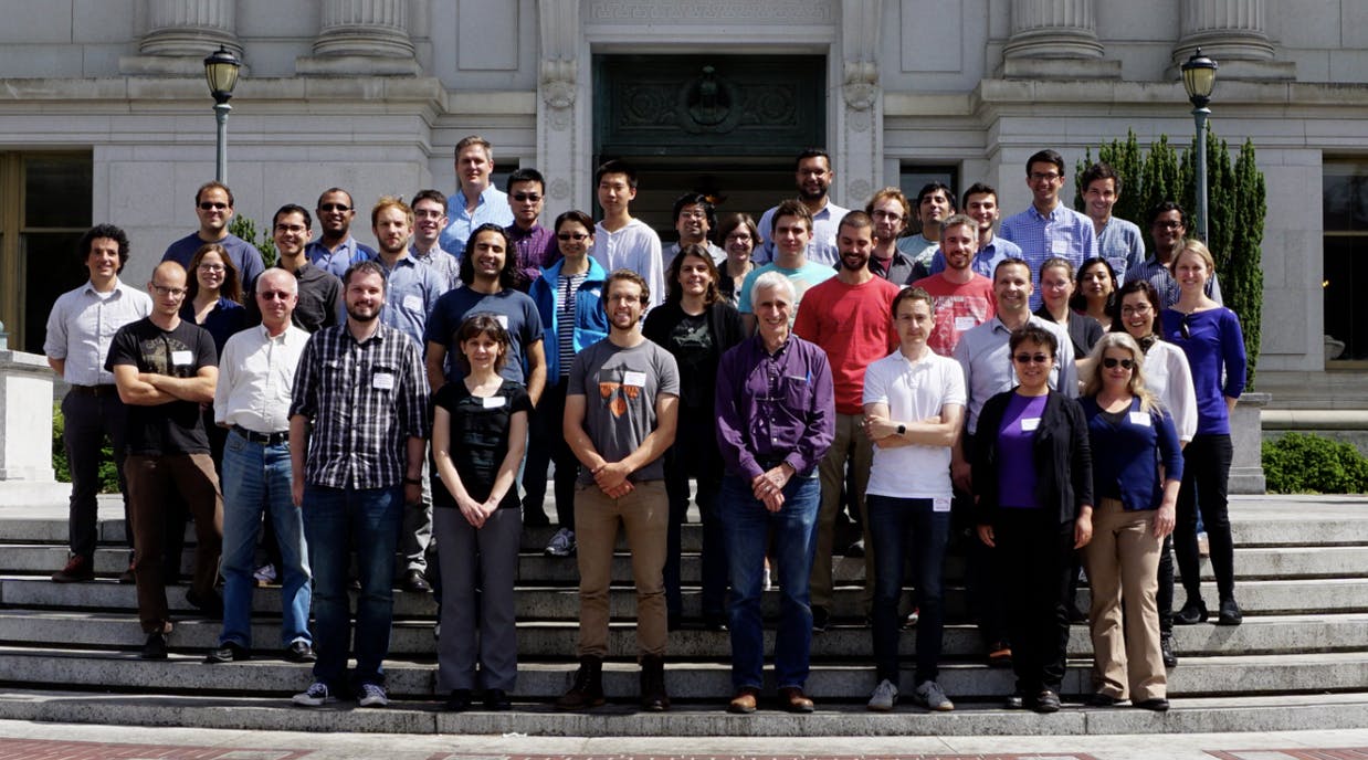 attendees of the inaugural ImageXD in 2016 posing outdoors for a photo on the stairs of a university building