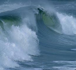 Ocean surface wave crashing