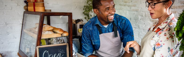 Business owners smiling