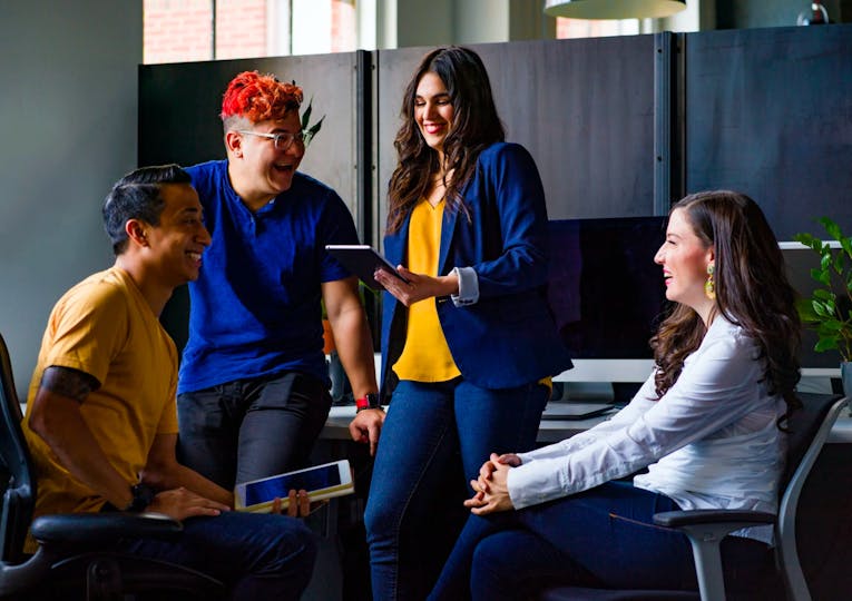 Team members collaborating in a group