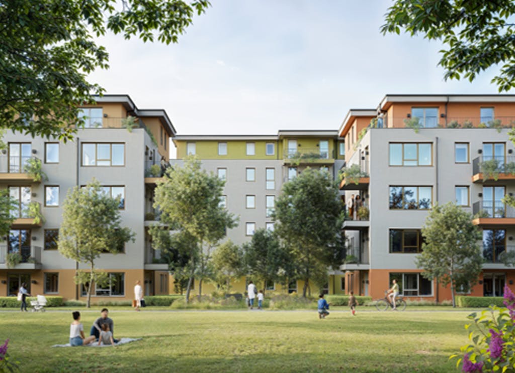 Visualisierung des Wohnparks Fliederhof in Magdeburg mit drei Wohngebäuden im Grünen.