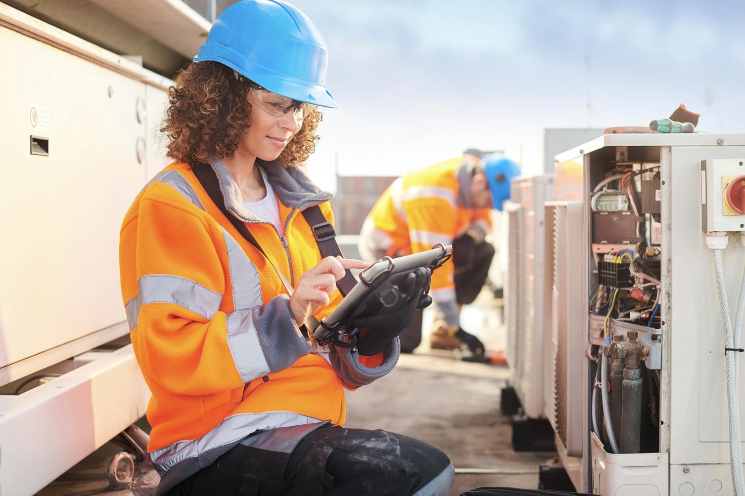 A service provider checks a 3D scan to reference the equipment of the facility they are working on. The technician is provided several benefits for utilizing 3D scans.