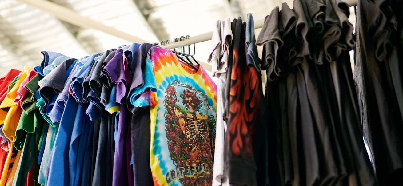 Vintage t-shirts hanging in the Restated Vintage warehouse