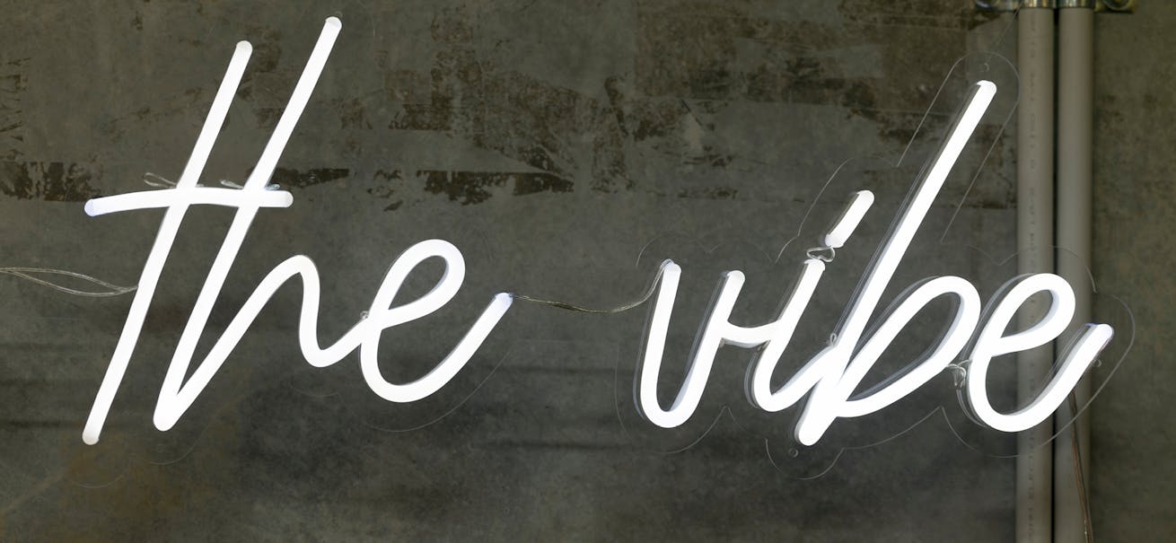 Chase The Vibe neon sign at LSKD headquarters